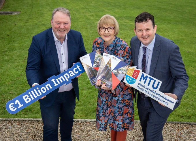 Dan Barry, Regional Director South & South East Enterprise Ireland; Professor Maggie Cusack, President MTU; Tim Daly, Head of Strategy & Performance MTU, celebrate the launch of the Economic and Social Impact Report Study for 2022/23.