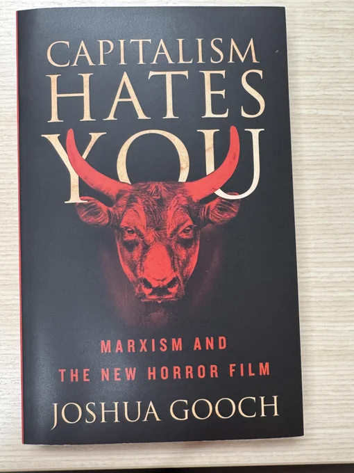 Black book cover features an image of a bull's head in red. Title is in yellow serif font at the top with the author's name in the same font below. Subtitle is above the author name in red san serif font.