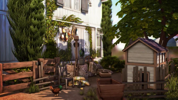 A side view of the house surrounded by greenery, featuring a chicken coop, a well, and some gardening essentials.
