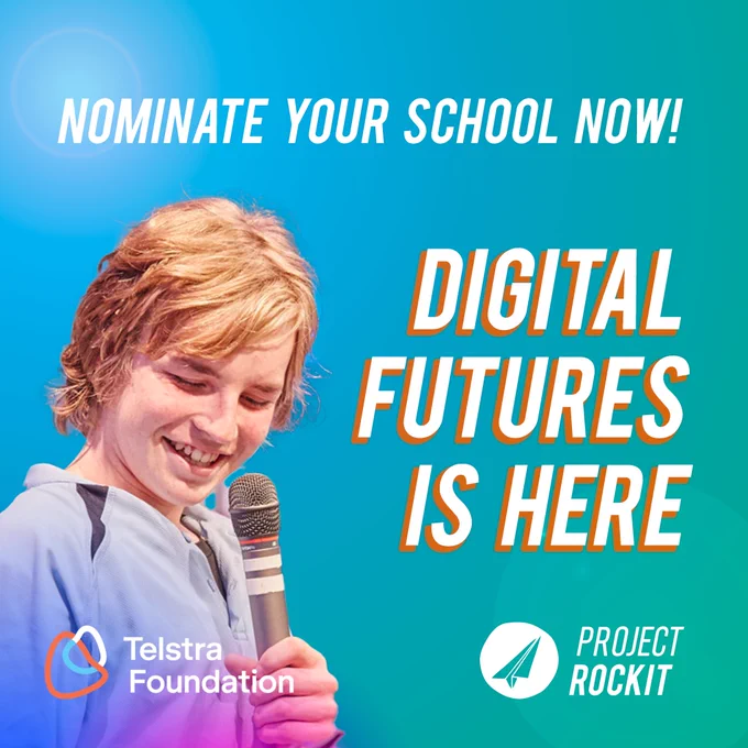 [ID A blue-green gradient tile with bold white text reading "Nominate Your School Now! Digital Futures Is Here". A close up of a Caucasian young man poses holds a microphone to his chest and looks downward with a smile. Telstra Foundation and PROJECT ROCKIT logos sit in the bottom corners.]