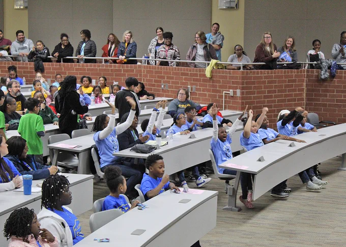 Photo from Rockdale County Helen Ruffin Reading Bowl January 25, 2025 at RCA, of students, teachers/staff, parents and audience.