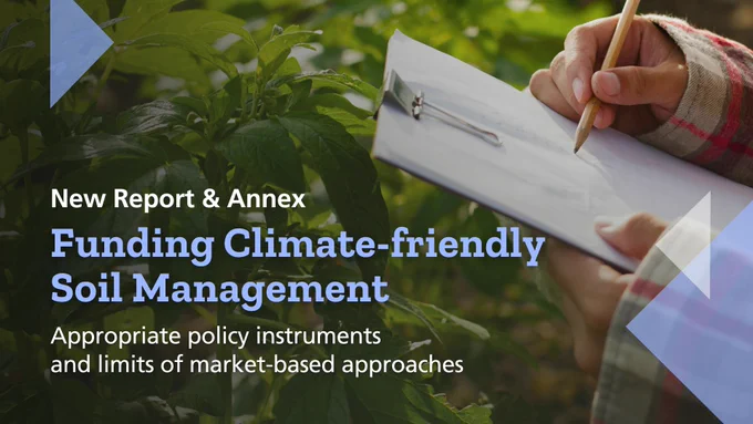 A person in a plaid shirt writing with a pencil on a clipboard while observing plants in a green environment. An overlaid text banner reads 'New report & annex. Funding Climate-friendly Soil Management. Appropriate policy instruments and limits of market-based approaches'.