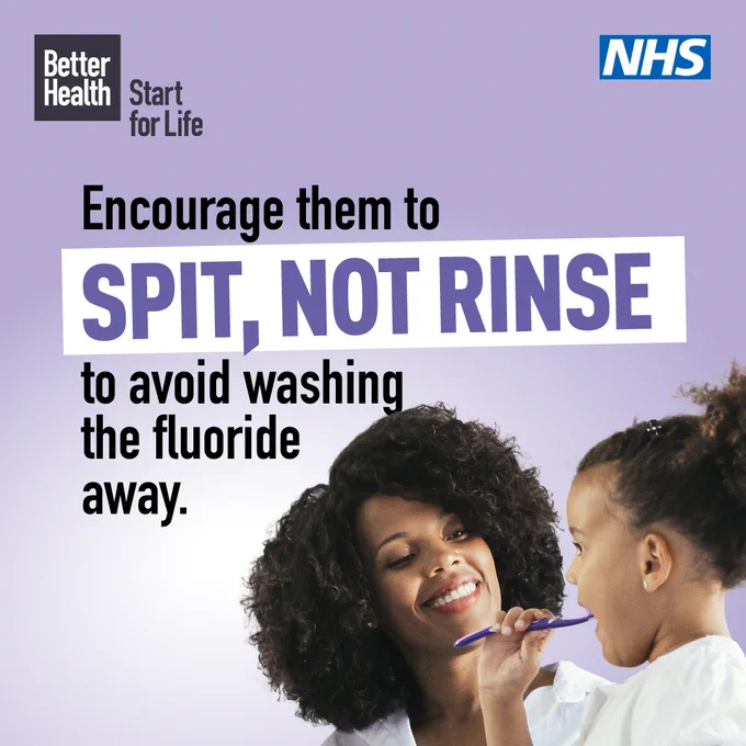 A mother helping her child brush their teeth with the caption "Encourage them to spit, not rinse, to avoid washing the fluoride away".