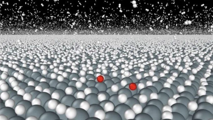 Field of gray and white spheres with two red ones; Caption/credit: An extreme-scale reactive molecular dynamics simulation. Image courtesy of Boris Kozinsky, Harvard University.