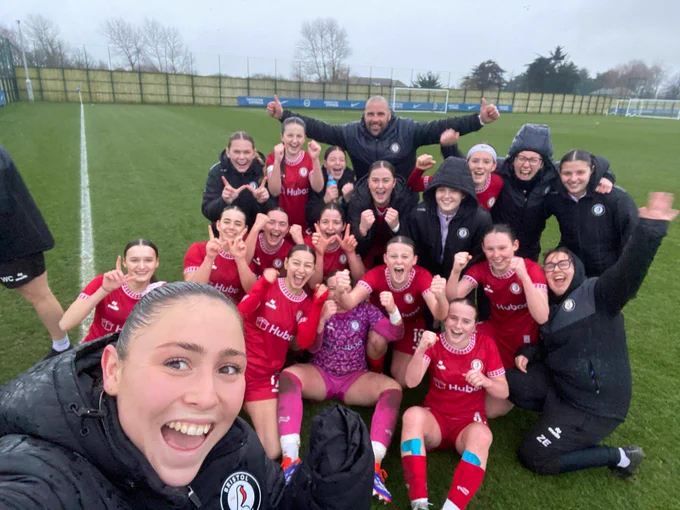 Bristol City Women Under-21s players celebrate on the pitch at full-time