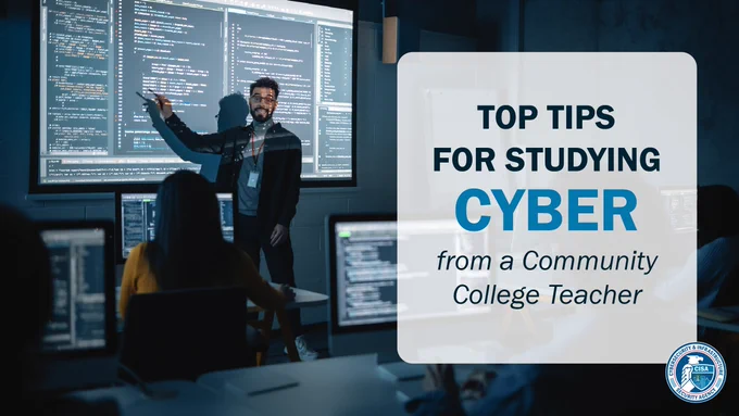 An instructor presenting "Top Tips for Studying Cyber" to students in a classroom equipped with multiple computer screens displaying code.