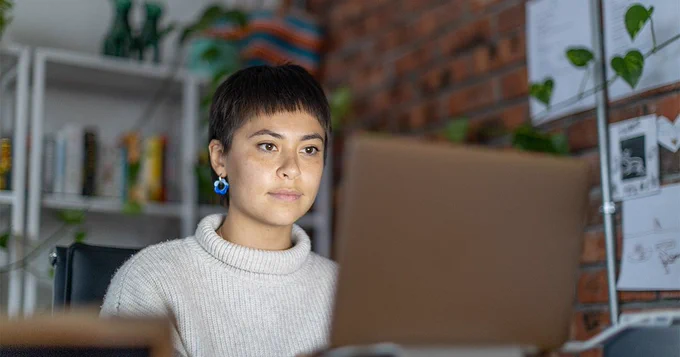 Student working at a computer.