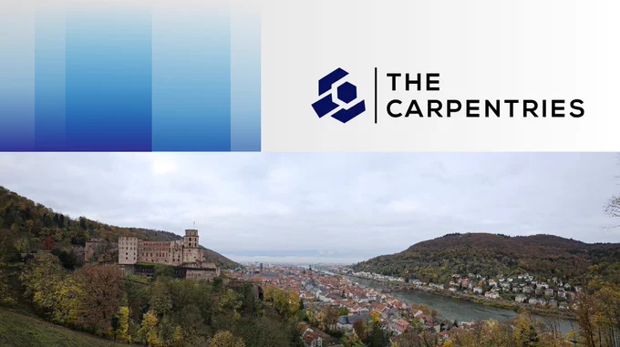 Panorama of Heidelberg castle and old town. The Carpentries logo.