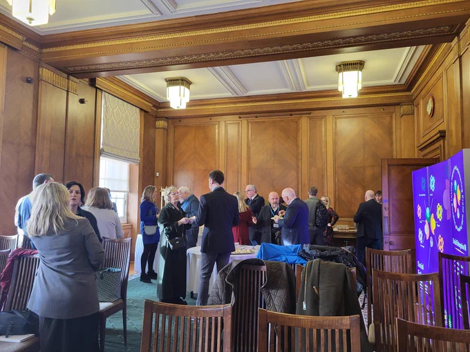 Room full of people at all party group 