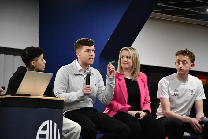 Caz Simone, Jordan Mason, Hannah Bermudez and Bertie Moore speaking on the panel at the Football v Homophobia 2025 Month of Action launch event