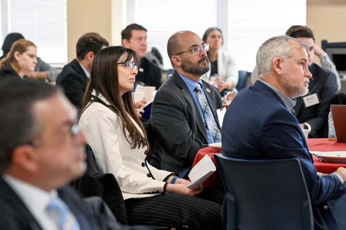 audience sitting listening to speaker