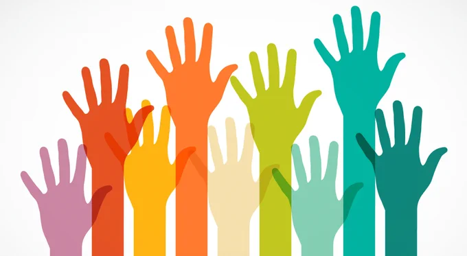 Illustration of multiple raised fists in various colors—red, orange, yellow, green, and teal—overlapping on a white background, symbolizing diversity, unity, and commitment to equity, diversity, and inclusion (EDI)