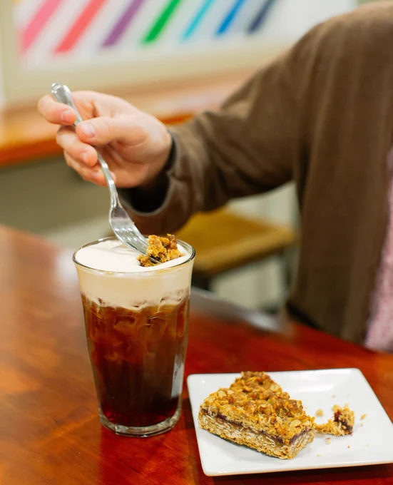 Image of sweet cream cold brew and scratch made oat bar.
