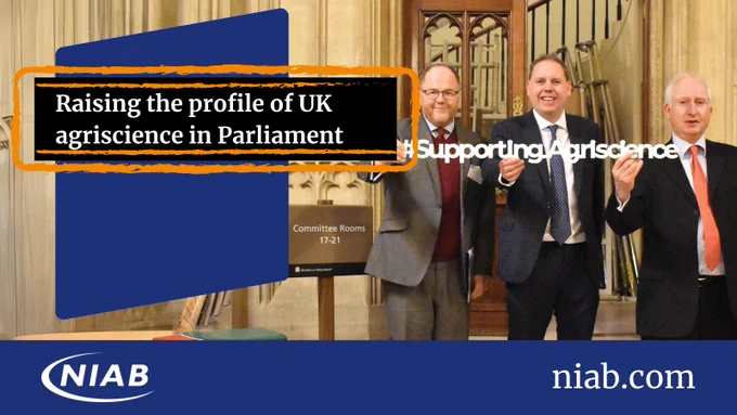 Agri-science Week in Parliament. George Freeman MP, Charlie Dewhirst MP and Daniel Zeichner MP, hold a #SupportingAgriscience banner.