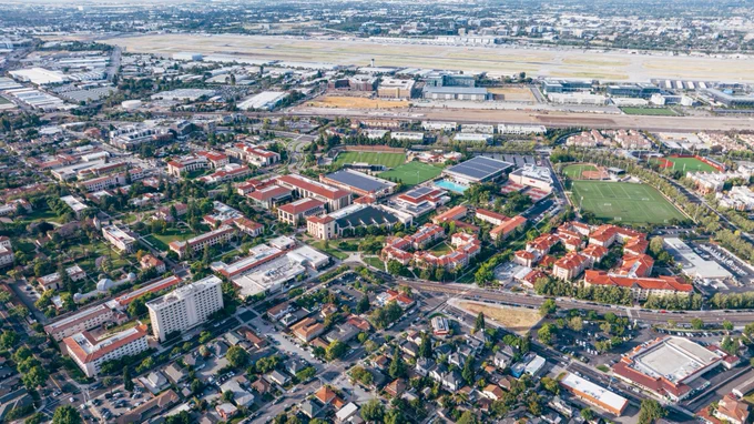 Aerial view of Santa Clara University campus showcasing academic buildings, sports facilities, and surrounding green spaces.
