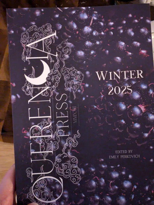 The cover of the Winter 2025 Anthology from Querencia Press. Edited by Emily Perkovich. The cover is a bunch of blackberries, very dark with little contrasts of red.