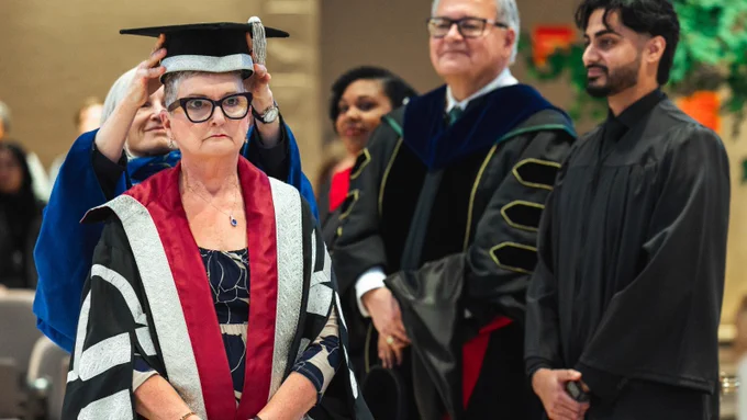 Photo of Linda Johnston at her installation