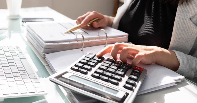 An accountant working on the numbers.