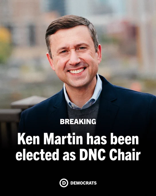 A graphic that says BREAKING: Ken Martin has been elected as DNC Chair. 

An image of DNC Chair Ken Martin is in the background. He is smiling and wearing a suit. 