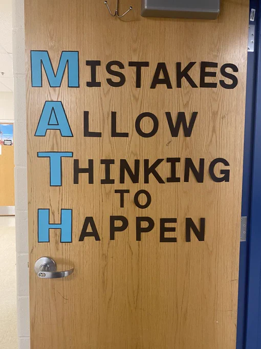Door display with acrostic message created from the word MATH: M(istakes) A(llow) T(hinking) to H(appen).