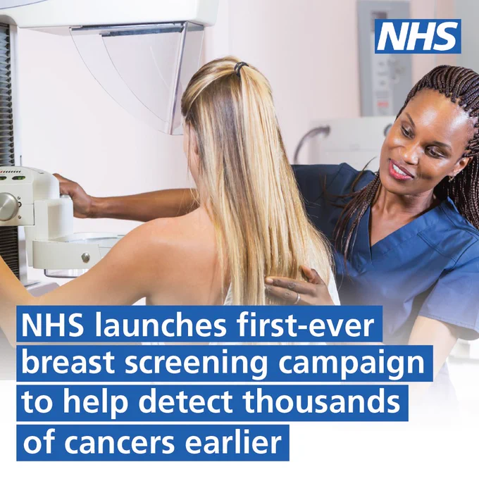 The image shows a healthcare professional in blue scrubs assisting a patient undergoing a mammogram. The patient, a woman with long blonde hair, is standing in front of a mammography machine. The healthcare worker is guiding her through the process. The NHS logo is displayed in the top right corner.Text reads: "NHS launches first-ever breast screening campaign to help detect thousands of cancers earlier."