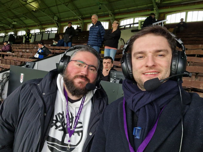 Alex and Sam mic'd up pre match, dressed in heavy coats! 