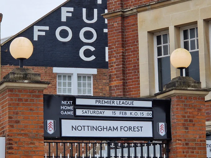 Photo of the Fulham "Next Home Game" sign outaide Craven Cottage