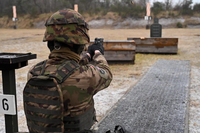 Italian soldier aiming at a target