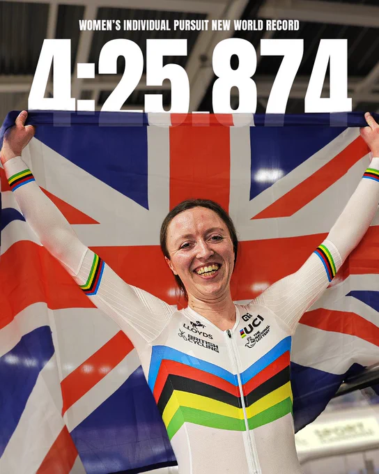 Anna Morris holds a British flag behind her as she celebrates her new world record