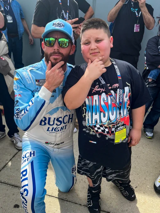 Ross Chastain and The Rizzler pose for a photo at DAYTONA.