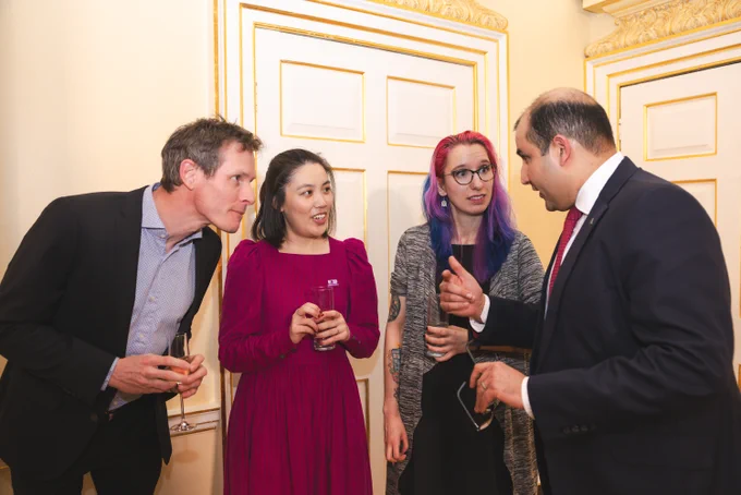 Attendees speaking at the Number 10 AI Reception