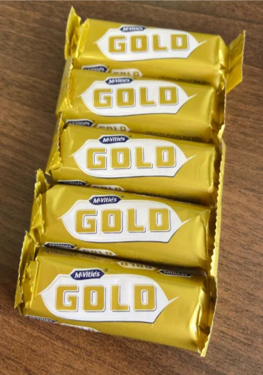 5 McVities Gold biscuit bars on a table.