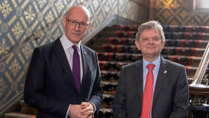 First Minister John Swinney with University of Glasgow Principal Professor Sir Anton Muscatelli.
