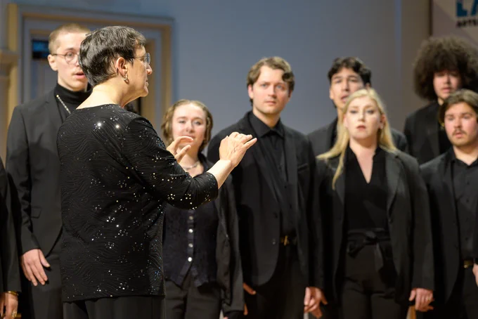 UO Chamber Choir on stage performing in New Zealand