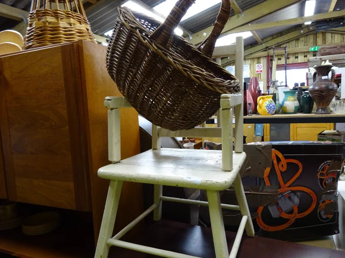 Furniture stacked up at the reuse shop