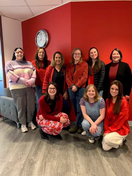 A group photo of American Heart Association staffers wearing red. Back row: ;Olivia, Julia, Chontelle, Lizzie, Marisa and Jen. Front row Lily, Mallory and Audrey.