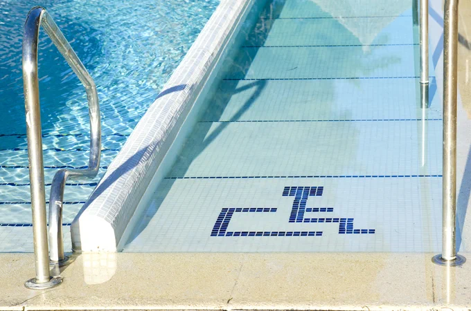 swimming pool wheelchair access ramp.