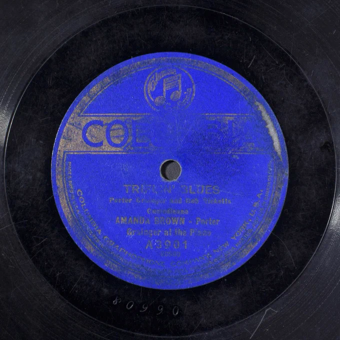 A very worn and scratched record label for "Triflin' Blues"--the letters are hard to read.