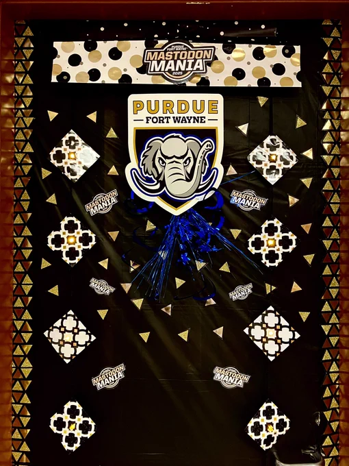 Door decorated for Mastodon Mania with Mastodon and gold and black decorations with Mastodon Mania logo