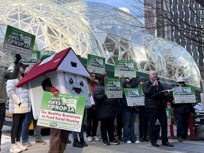 Social housing advocates hold a press conference