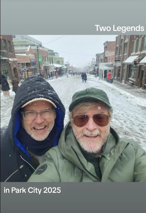 Picture of Rhys Darby and Leon Kirkbeck in the snow, with white text says Two Legends In Park City 2025