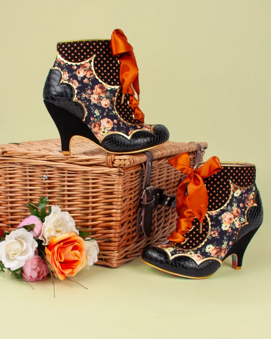 Irregular Choice 'Dolly Mixture' heeled boots. Orange & black rose pattern, orange polka dot