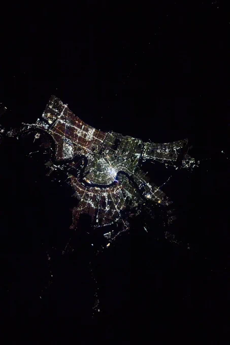 The city lights of New Orleans, Louisiana, and its suburbs along the Mississippi River and on the shoreline of Lake Pontchartrain are pictured at approximately 1:16 a.m. local time from the International Space Station as it orbited 258 miles above.
