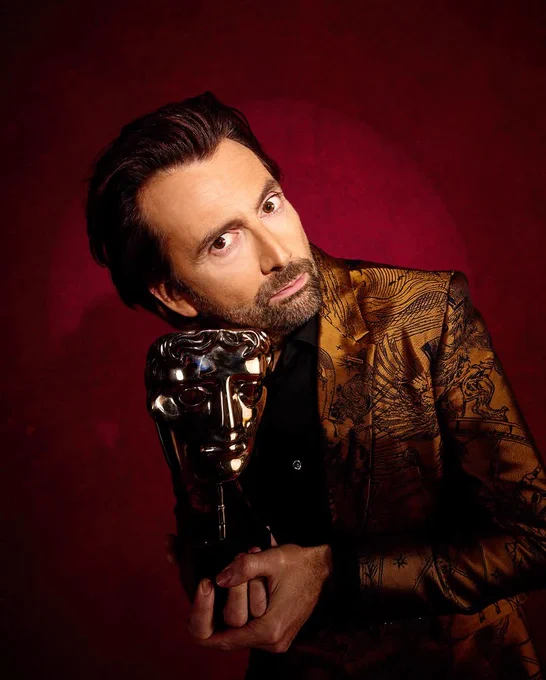 BAFTA host David Tennant with Mitzi's mask © BAFTA
