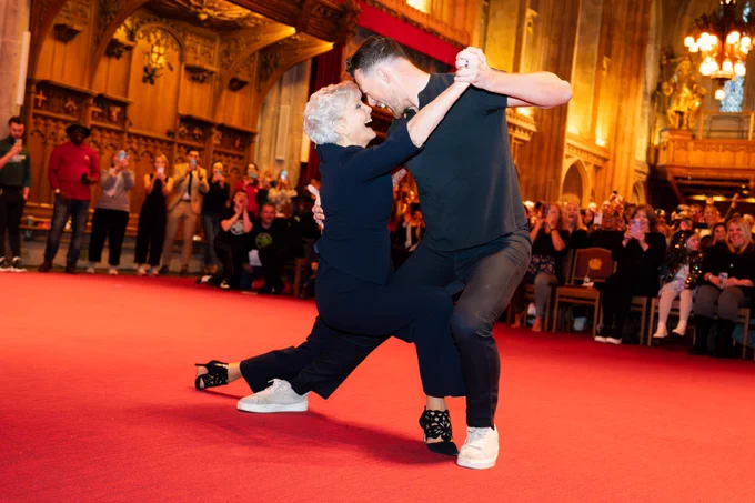 Angela Rippon CBE and Kai Widdrington lunging as they perform the Argentine Tango.
