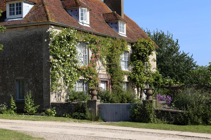 Large house covered in ivy