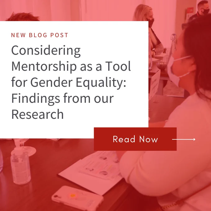 A blog post graphic. The title is "Considering Mentorship as a Tool for Gender Equality: Findings from our Research," displayed in a bold, sans-serif font. The background is a reddish-pink color. The graphic also displays blurred images of people wearing face masks with documents and papers visible at a mentorship launch, but the focus is on the title and the “Read Now” button. The button is prominent, rectangular, and reddish-orange for a call to action, inviting the reader to click for more information. The overall style is modern and attention-grabbing.