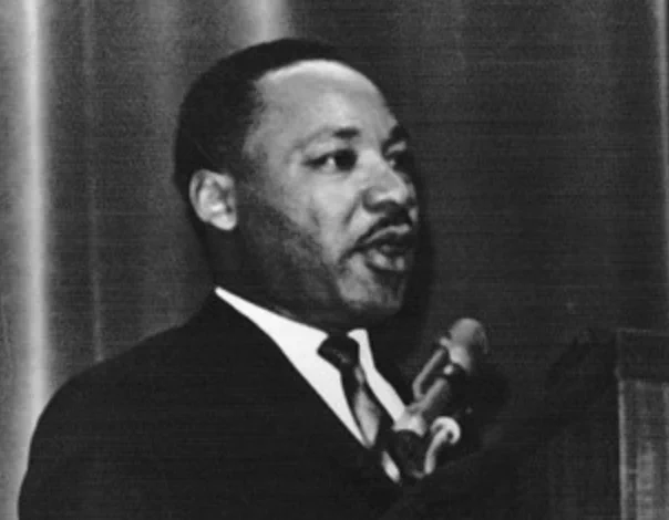 MLK speaking at a podium