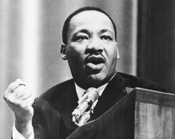 MLK speaking at a podium