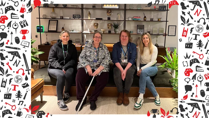 Alex is joined for a photo in the Ninja Theory studio by members of the Ninja Theory team and Kathy from the RCE Wellbeing Hub. 